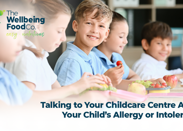 Parents talking with a childcare educator at a centre about children’s food allergies and dietary needs.