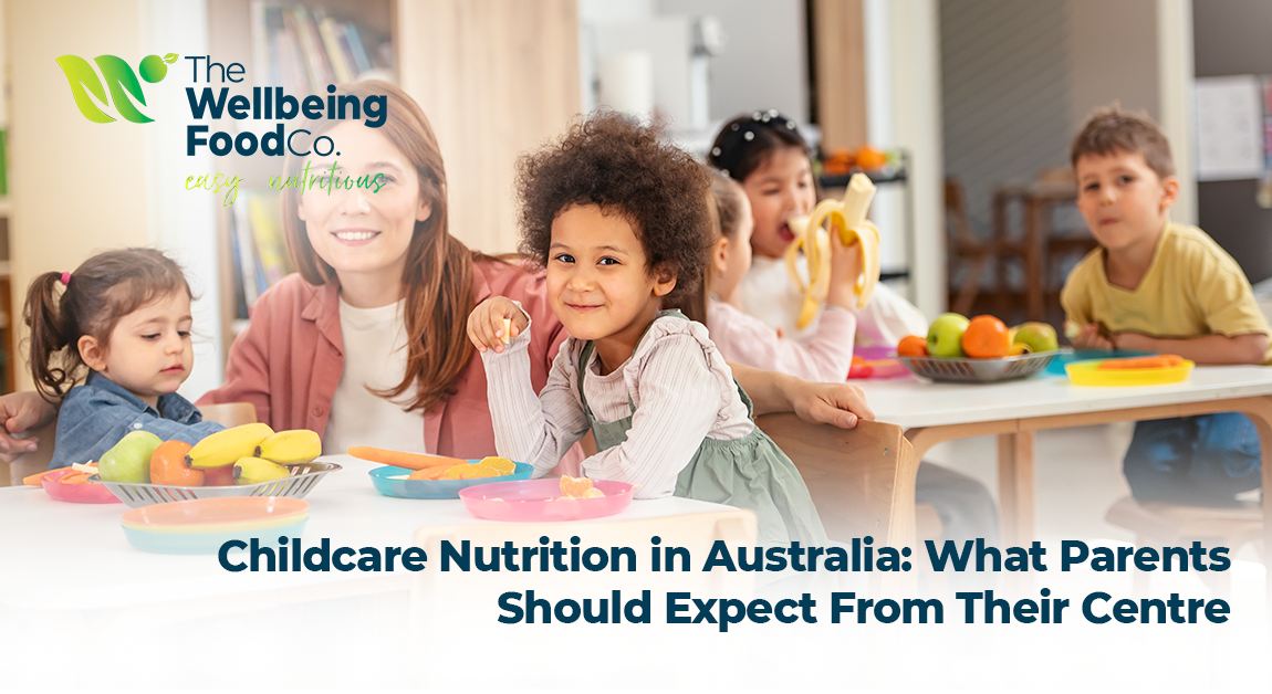 Happy children eating nutritious meals together at a childcare centre table.